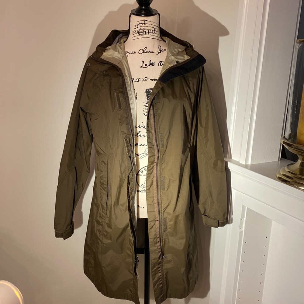 Small green raincoat